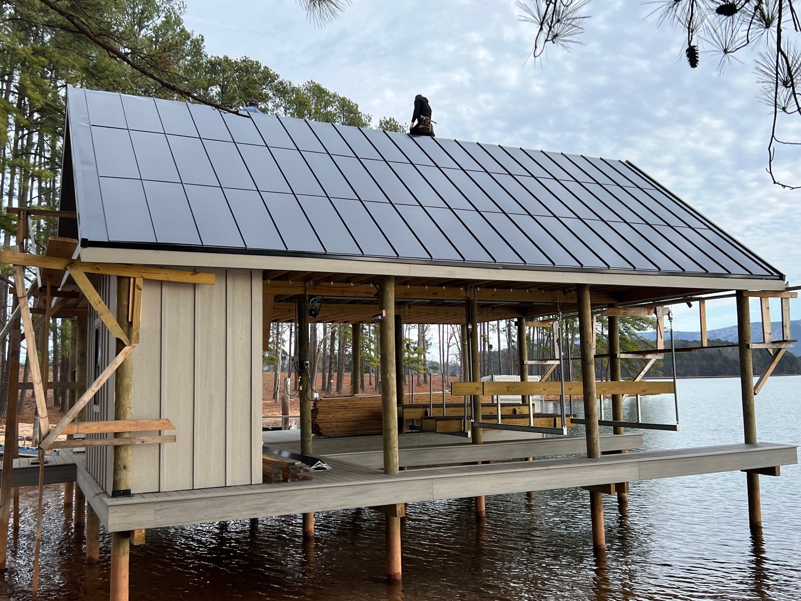 Boathouse at Smith Mountain Lake, Virginia, with an integrated solar roof going on