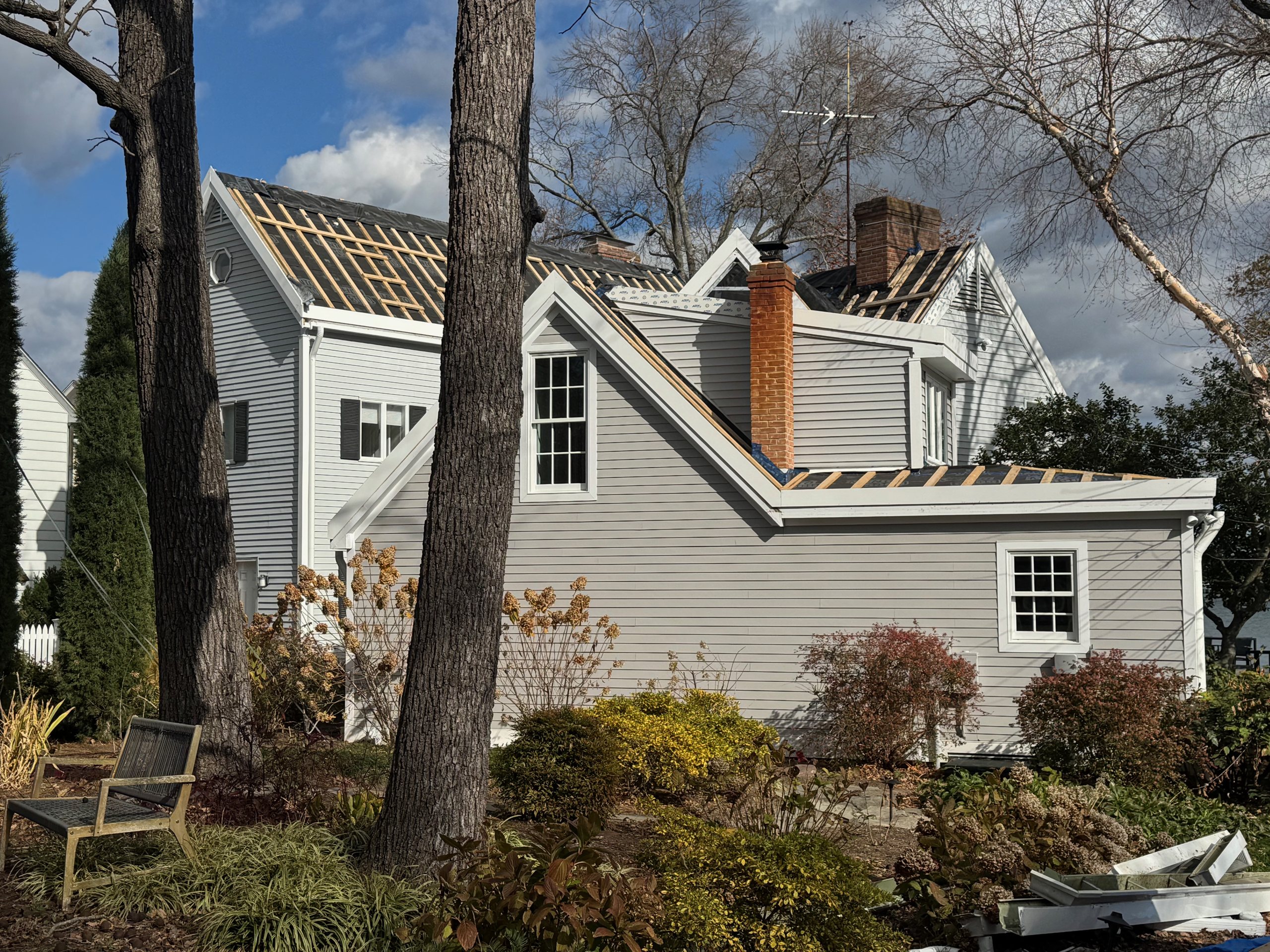 Roofit.Solar roof underway on a Maryland colonial home