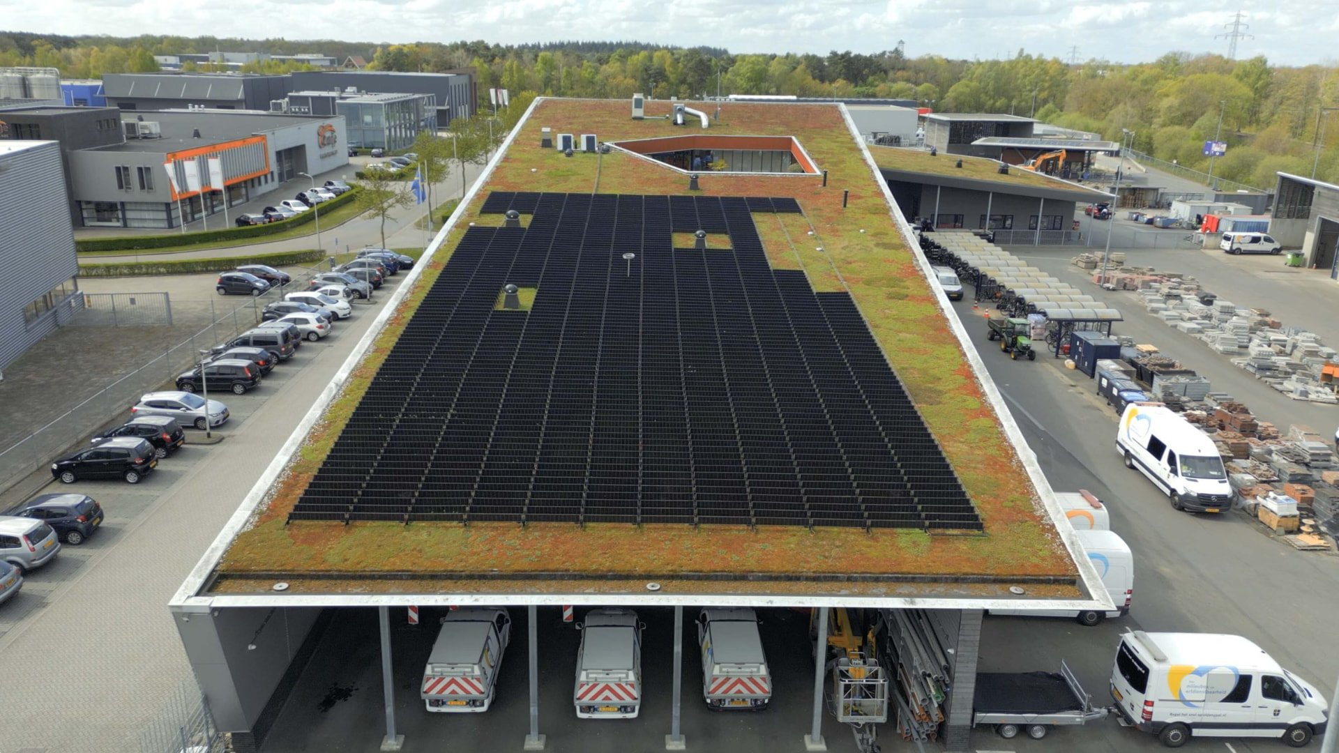 Aerial view of vertical solar rows on a green roof in the Netherlands