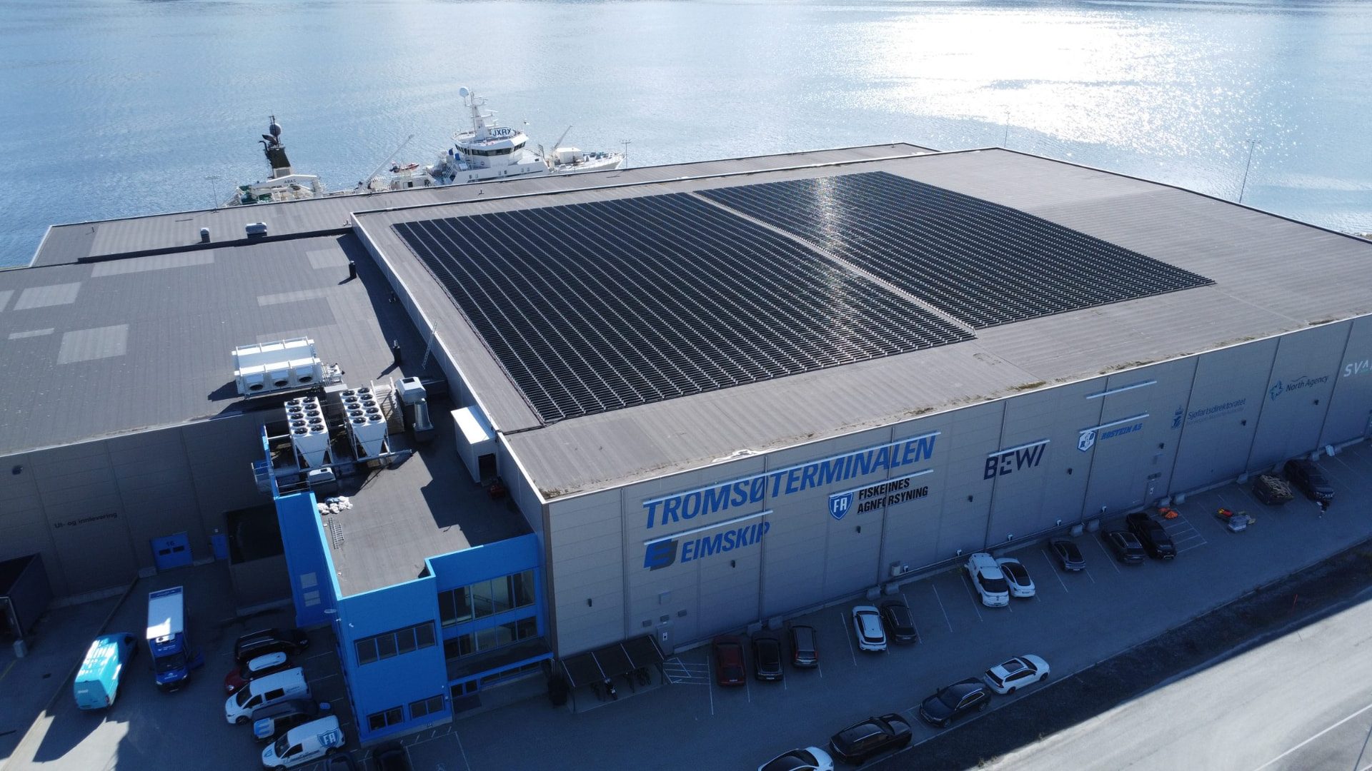 Aerial view of Over Easy Solar rows on the Tromsoterminalen roof in Tromso, Norway